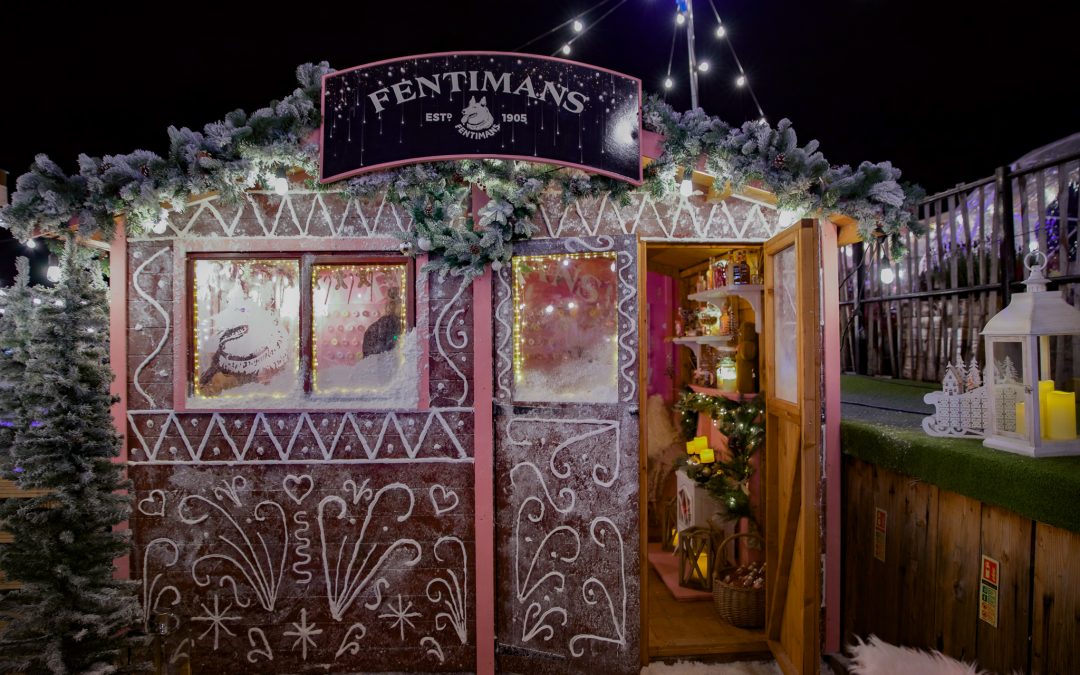 A Pink Life Size Gingerbread House with Fentimans